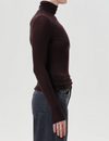 Pascale Turtleneck, Root