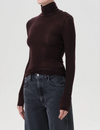 Pascale Turtleneck, Root